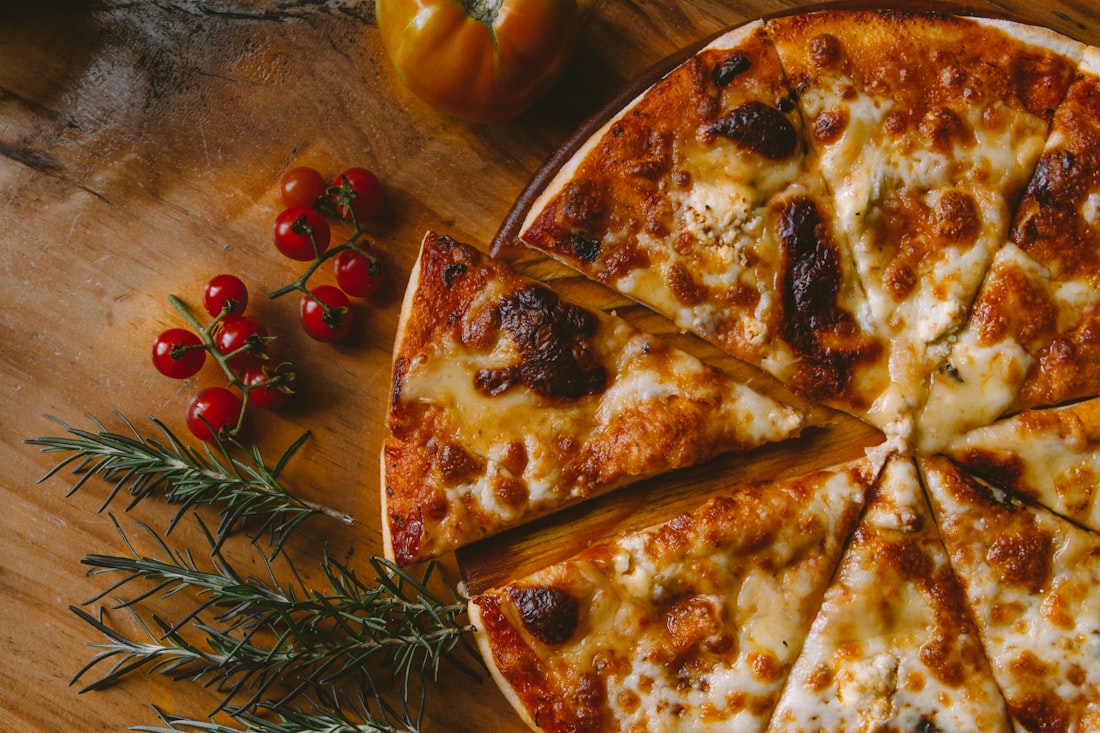Stone-baked cheese pizza on a wooden board